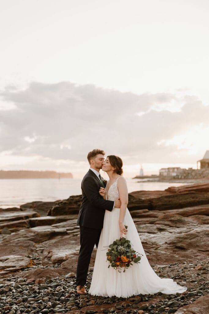 Bride and groom sunset photos red rocks St. Andrews NB