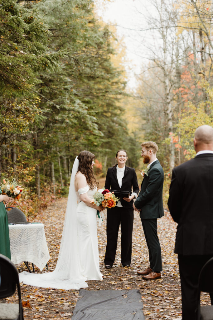 Bride and Groom standing at the alter for a fall wedding at Irishtown Nature Park