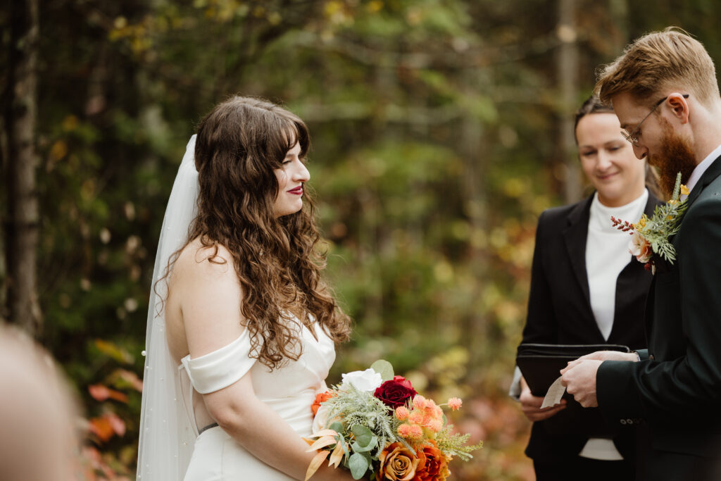 Fall wedding Bride gazing at groom
