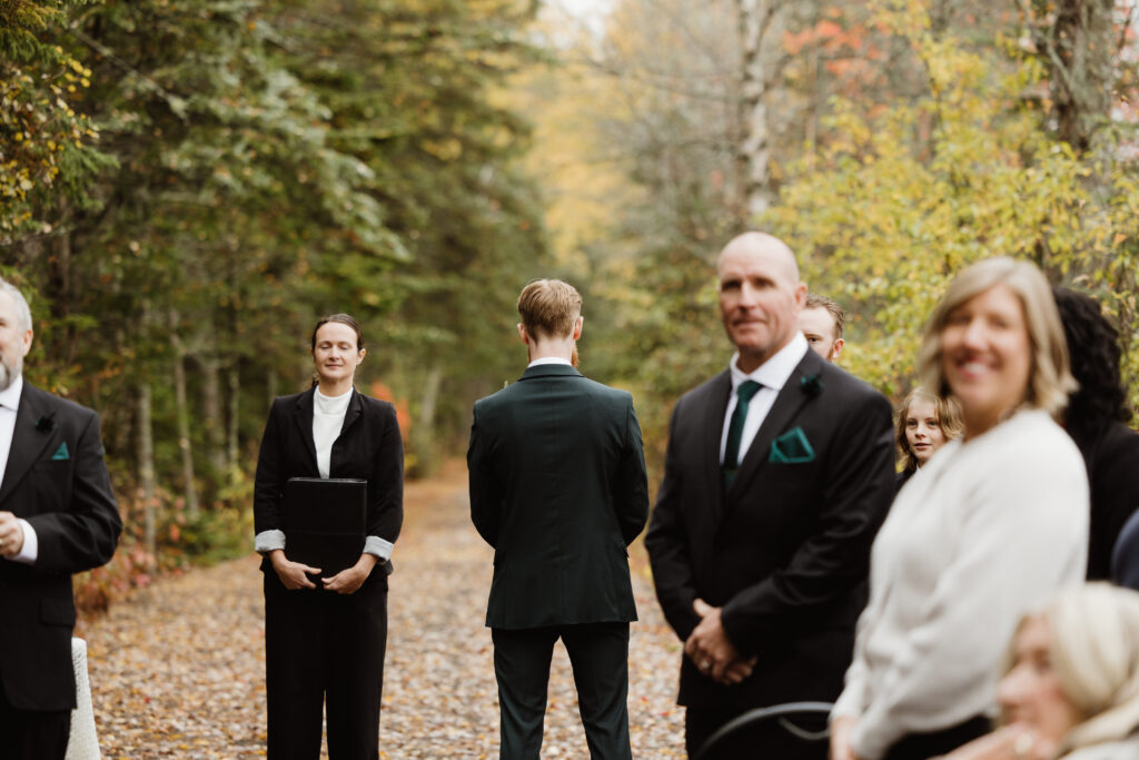 Groom waiting for bride to walk down isle at Irishtown Nature Park, Moncton NB