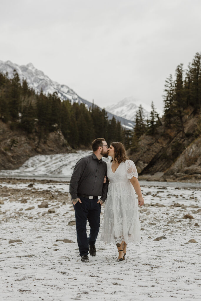 Engagement pictures in front of Bow Falls Banff Alberta