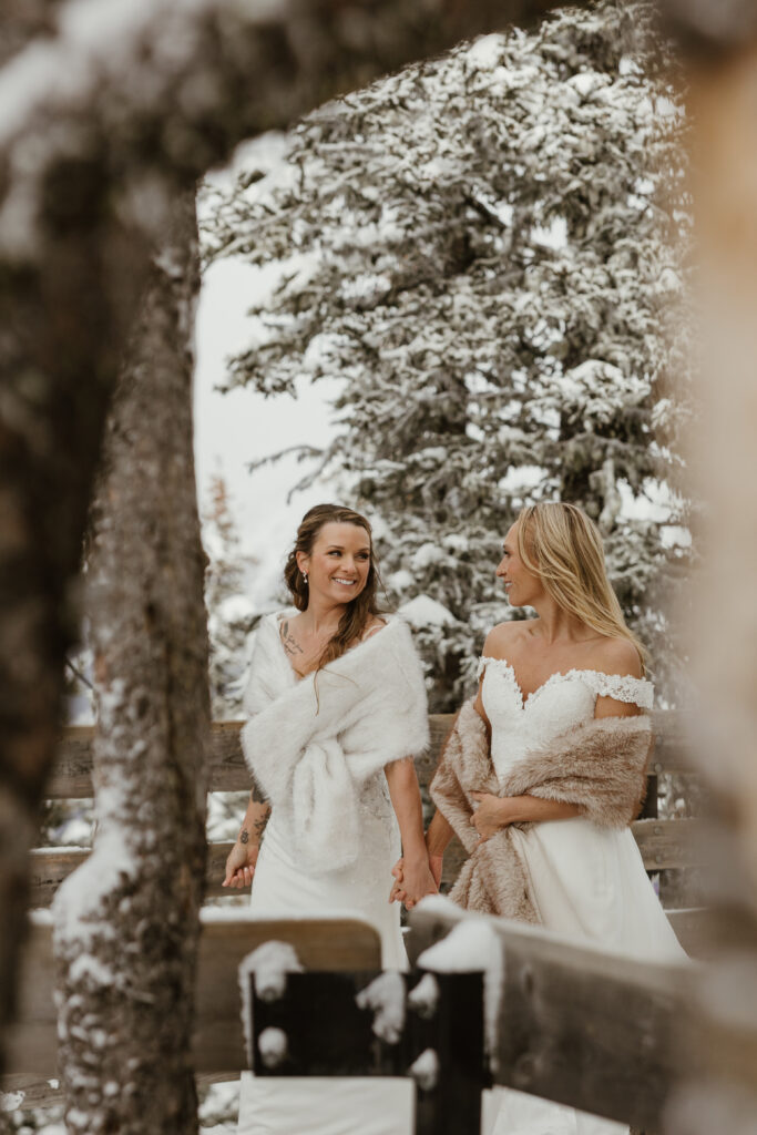 Brides walking together at Summit Ridge
during elopement 