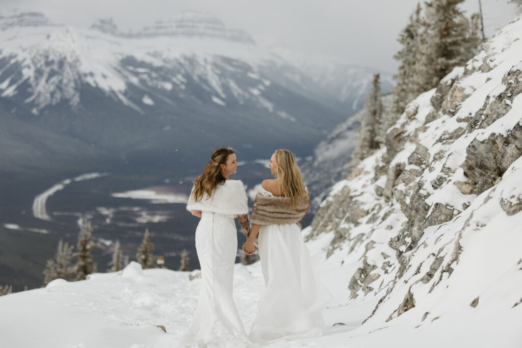 Back of brides at Summit Ridge elopement
